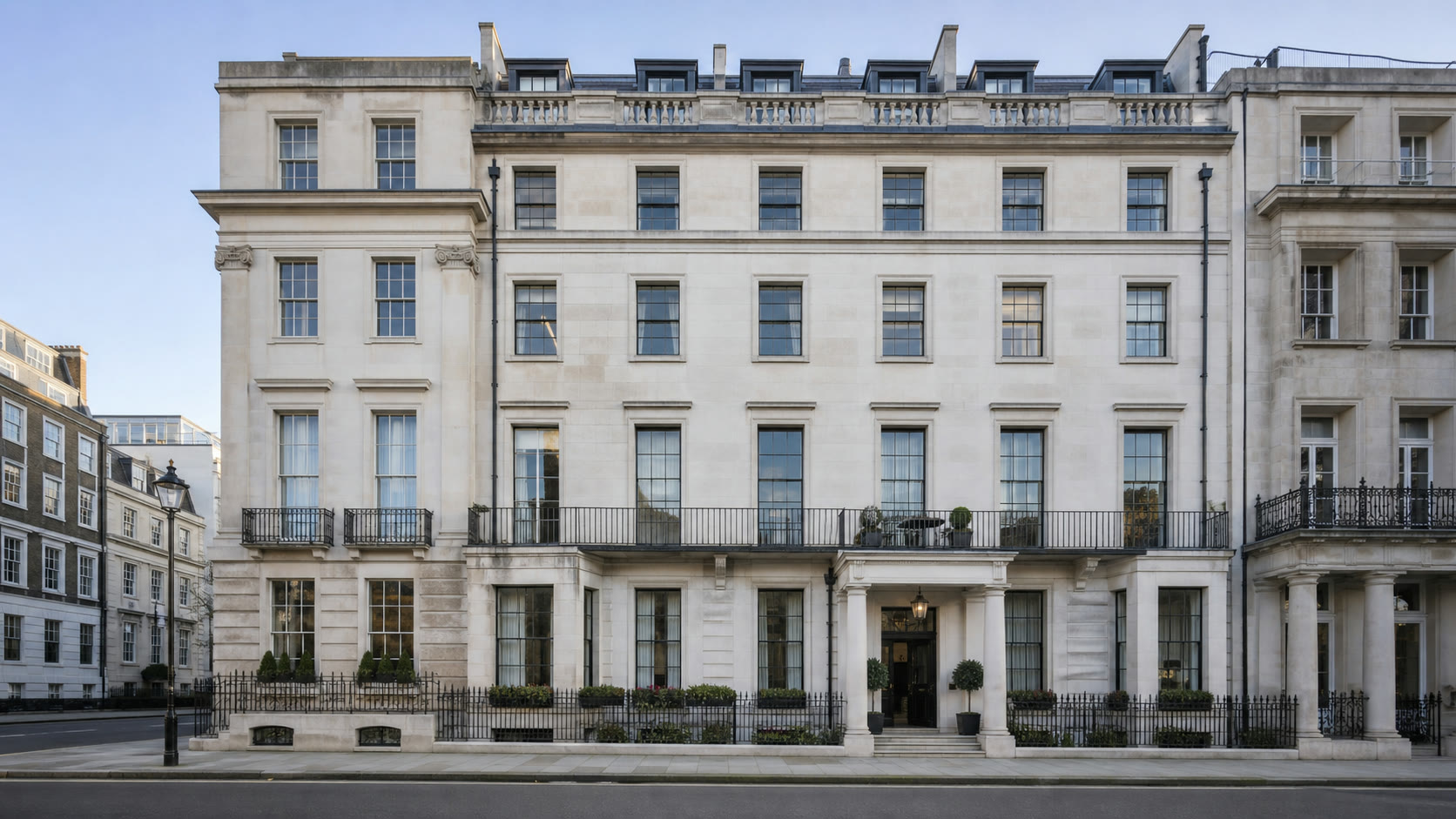 Stone facade of a lateral apartment building on Mount Street